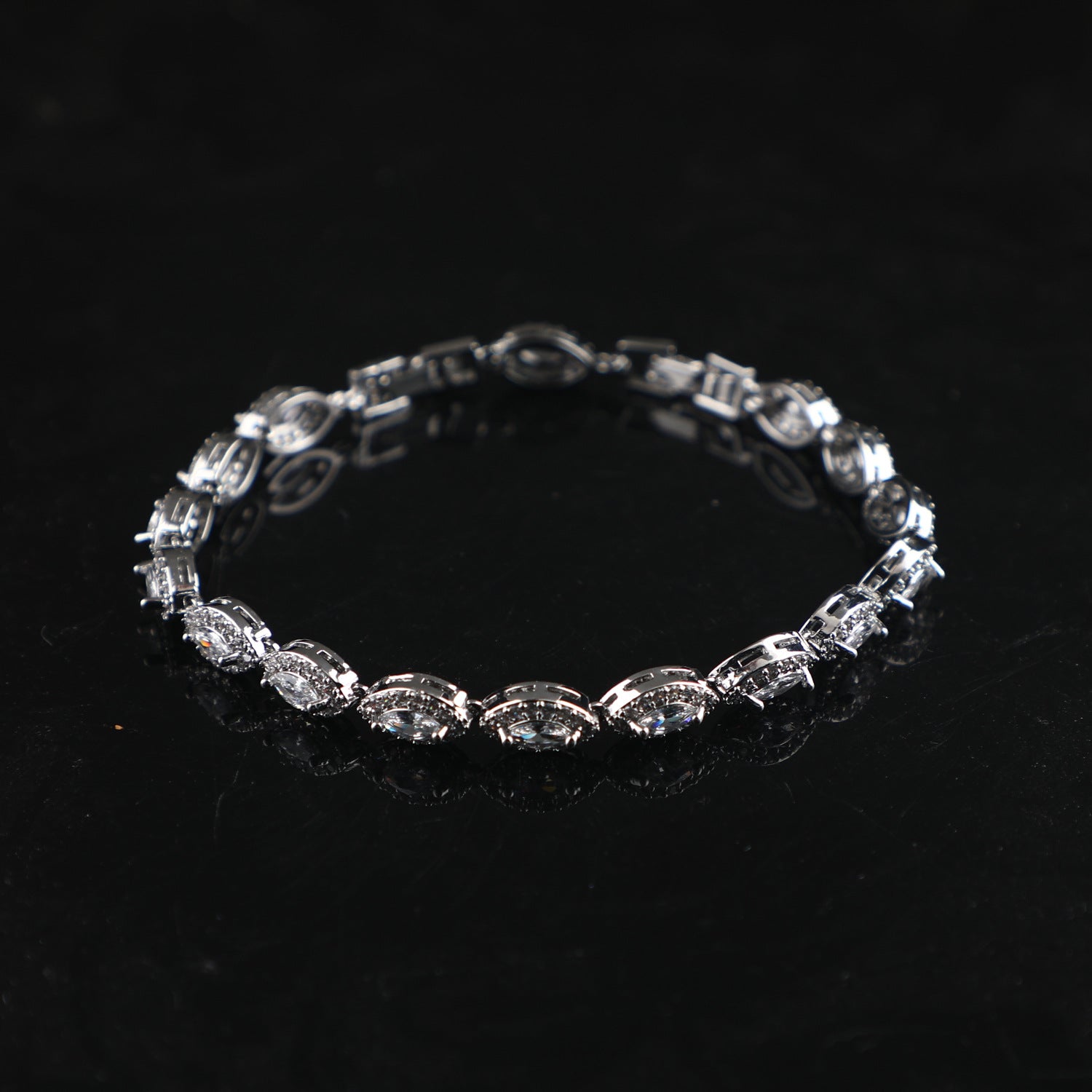 Silver bracelet with gemstones.